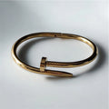 Gold nail bracelet in stainless steel