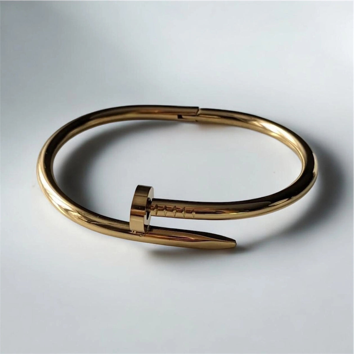 Gold nail bracelet in stainless steel